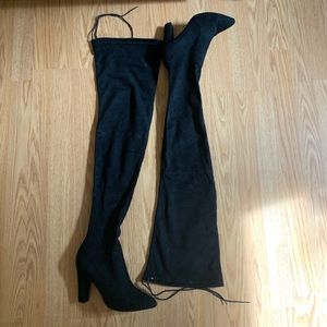 Thigh high black boots